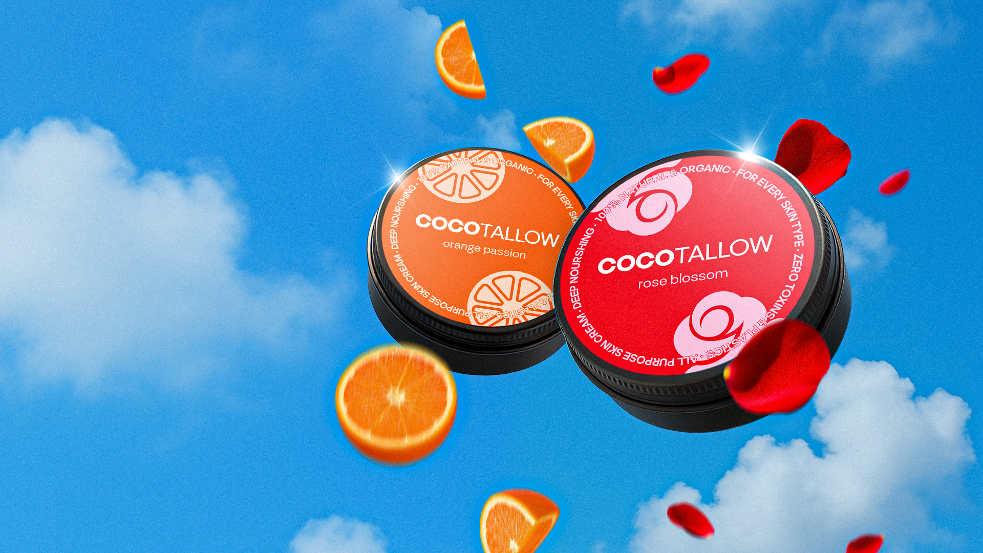 Two Coco Tallow products with orange slices and red flowers against a blue sky background